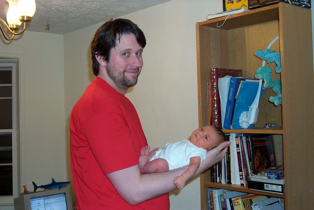 Daddy holding Jenya (8 days old)
