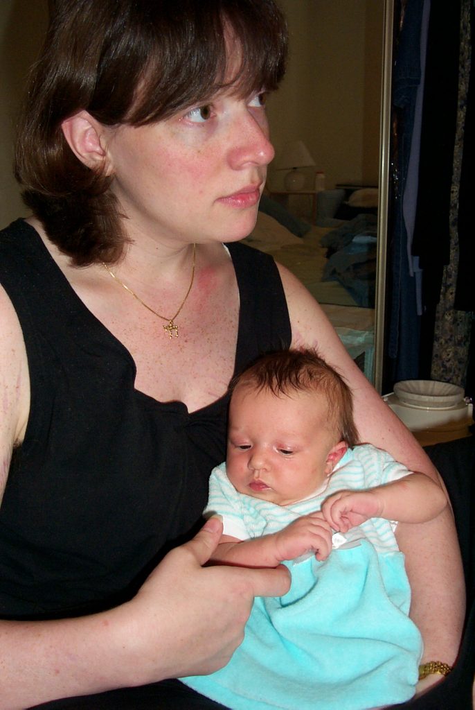 3 week old Jenya, with Mama, dress is present from Harry's mom